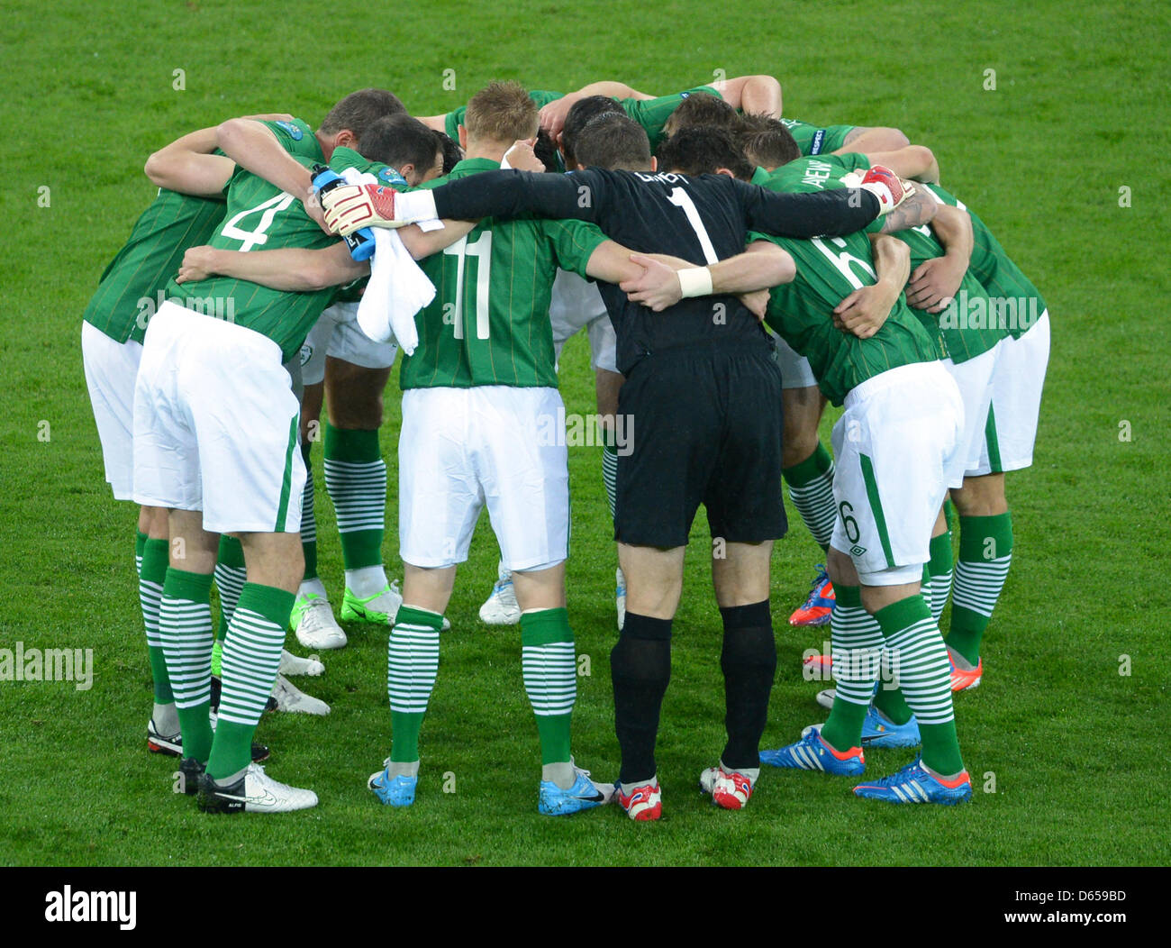 Ireland's team makes a circle before the UEFA EURO 2012 group C soccer