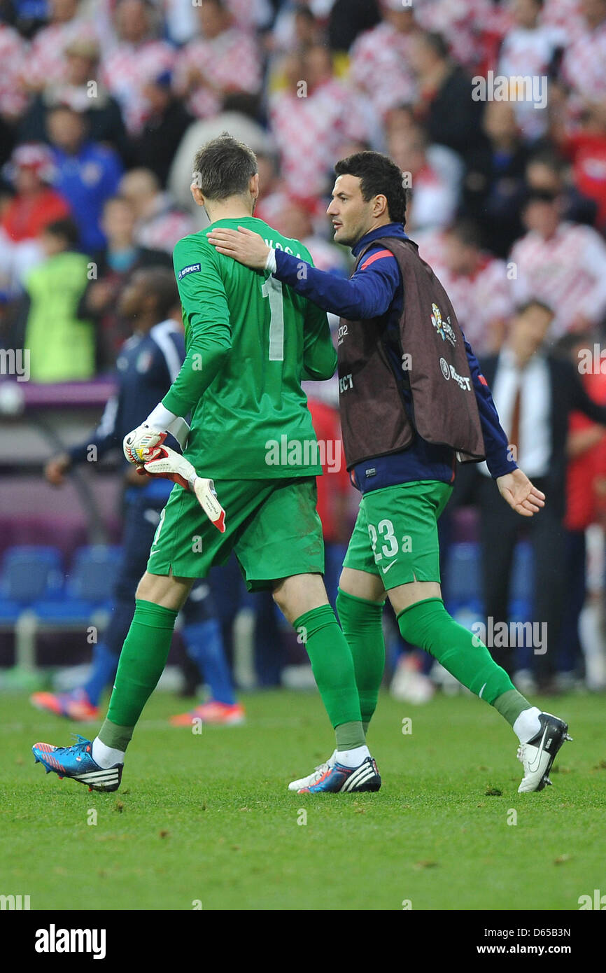 Croatia's Stipe Pletikosa (L) and Danijel Subasic talk to each toher as they walk across the pitch during the Euro 2012 group match between Italy and Croatia in Poznan, Poland, 14 June 2012. Photo: Revierfoto Stock Photo
