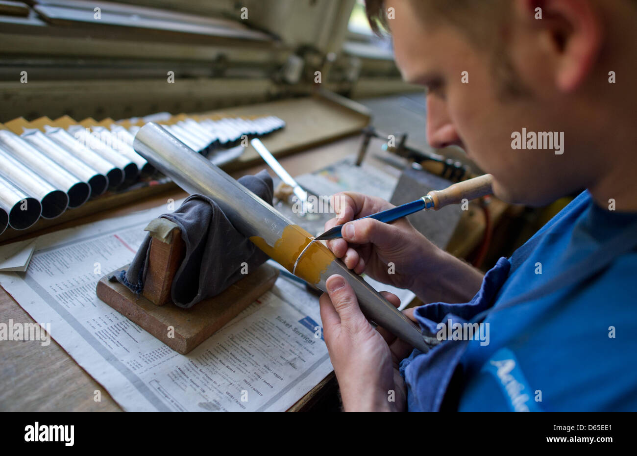 An employee of organ pipe manufacturer Mittermaier & Soehne assembles an organ pipe in  Sinsheim, Germany, 24 May 2012. Photo: Uwe Anspach Stock Photo