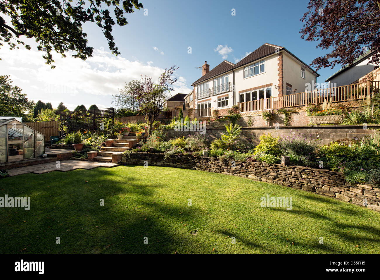 A renovated English 1930's home and gardens Stock Photo