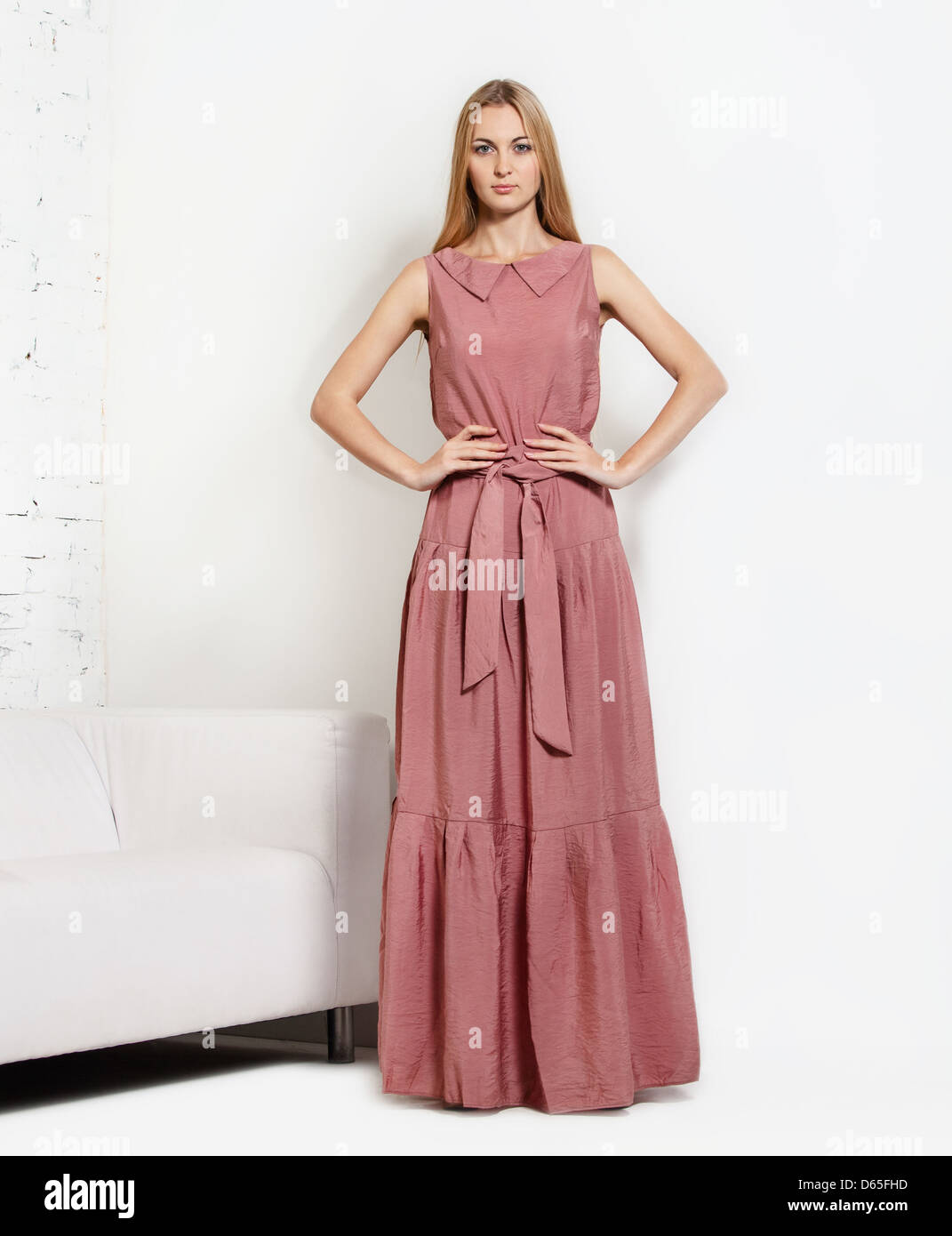 Portrait of the blond girl in long dress Stock Photo - Alamy