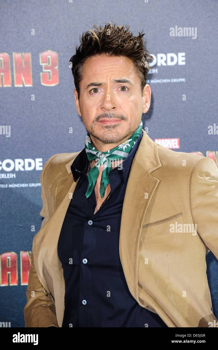 Munich, Germany. 12th April 2013. Robert Downey Jr. in Bavarian costume 'Lederhosen' attends to the Photocall of the movie 'Iron Man 3' in Munich at the hotel BayerischerHof on April 12 2013 in Munich - Munich Credit: dpa picture alliance / Alamy Live News Stock Photo