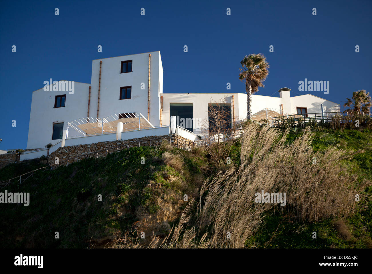 A house on a cliff in Balestrate, Sicily. Stock Photo