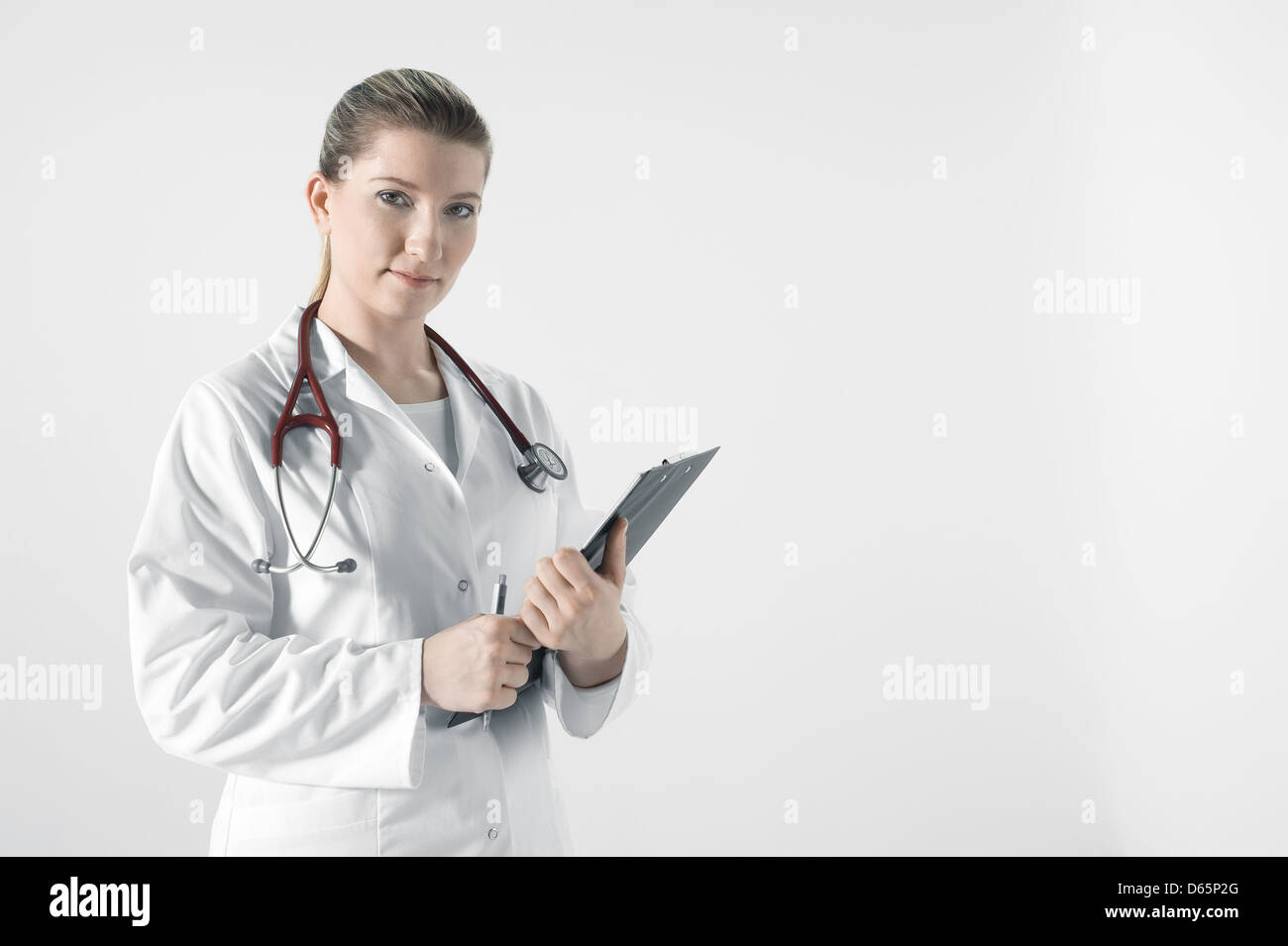 Female doctor young in white hi-res stock photography and images - Alamy