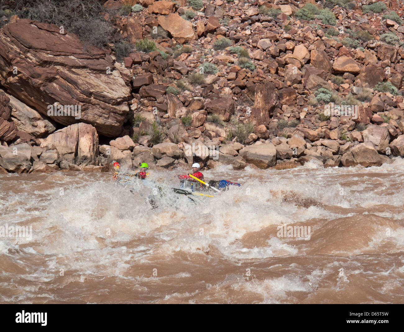 Grand Canyon National Park, Arizona - A raft navigates Hance Rapids on the Colorado River. Stock Photo
