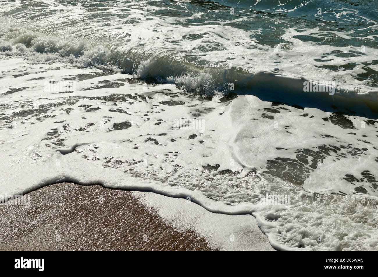Closeup of beautiful white sea foam and waves Stock Photo