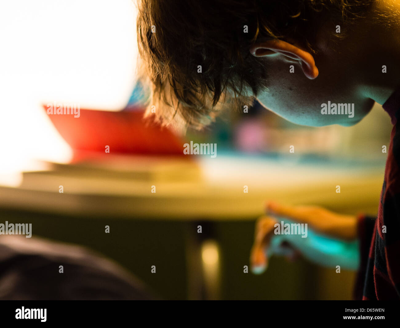 Boy playing game console hi-res stock photography and images - Alamy