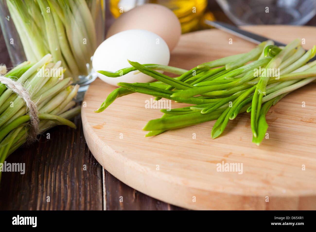 wild garlic on a cutting board, the ingredients for a salad closeup Stock Photo