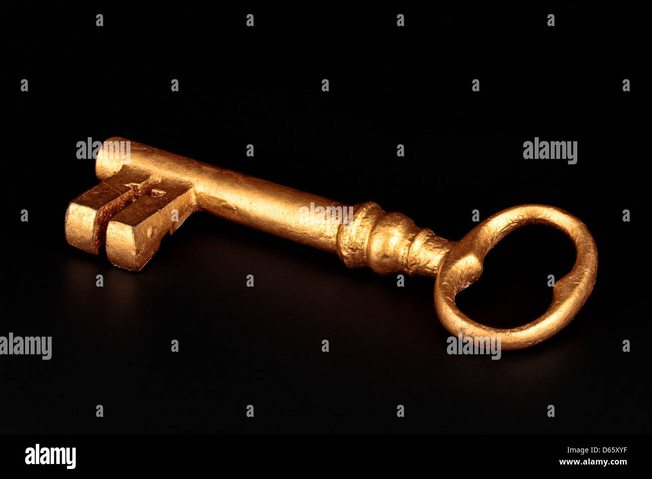 Golden key to success Stock Photo