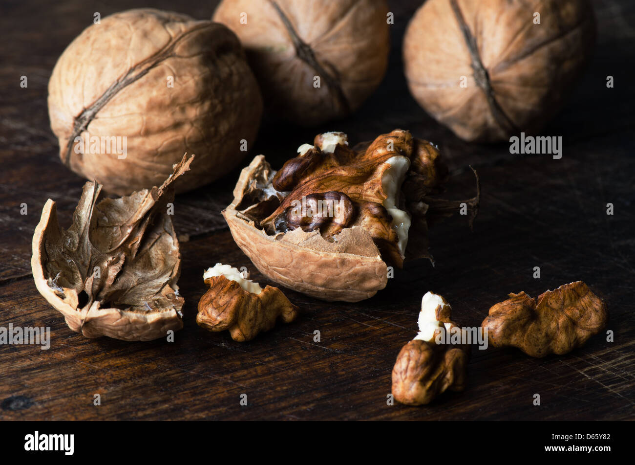 Walnuts on wooden table Stock Photo
