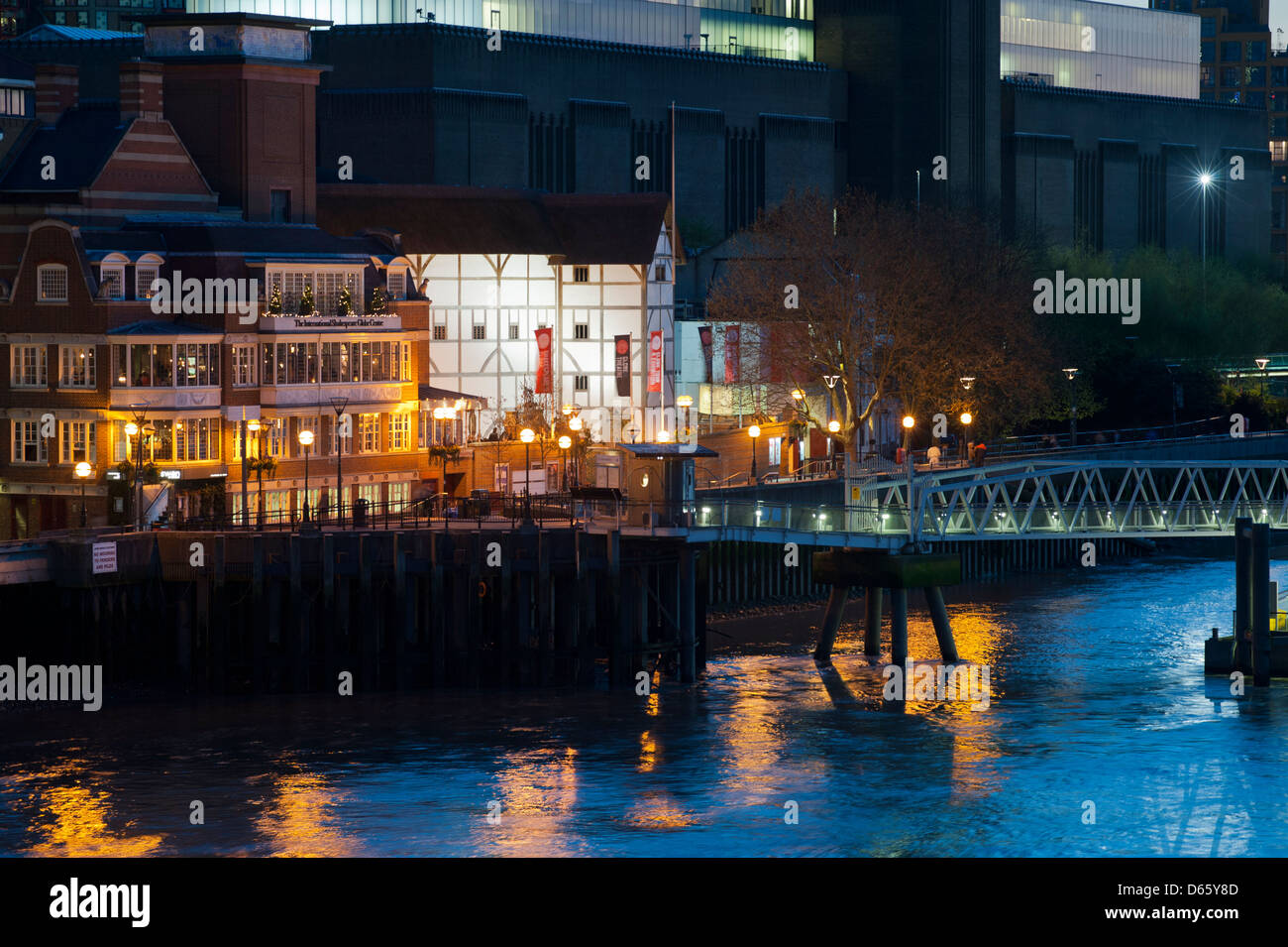 The Globe Theatre and Shakespeare Centre on the south bank of the River Thames in London, UK, at dusk. Stock Photo