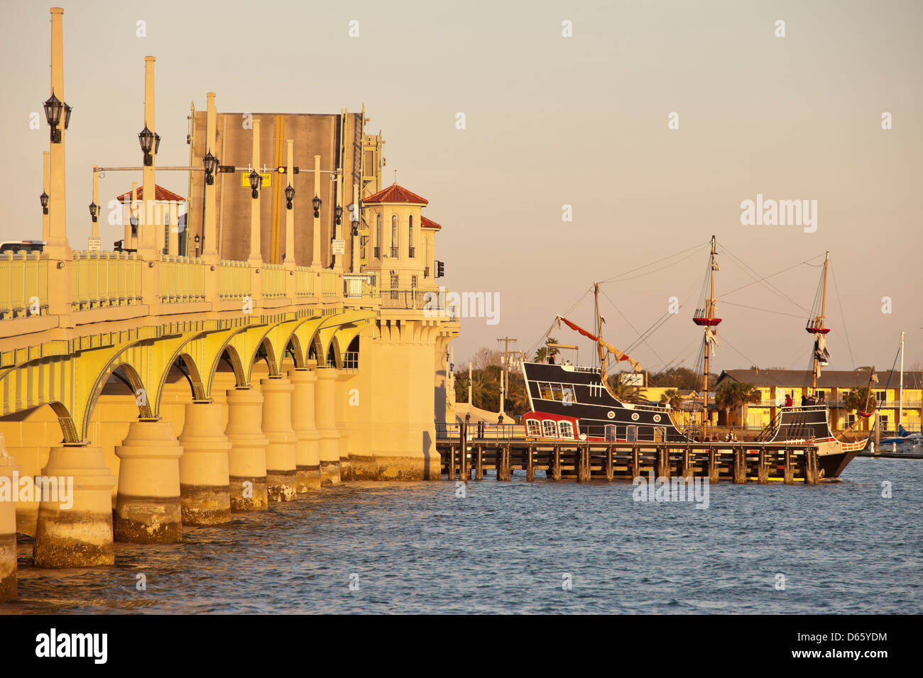 SAILBOAT PASSING UNDER RAISED BRIDGE OF LIONS INTERCOASTAL WATERWAY