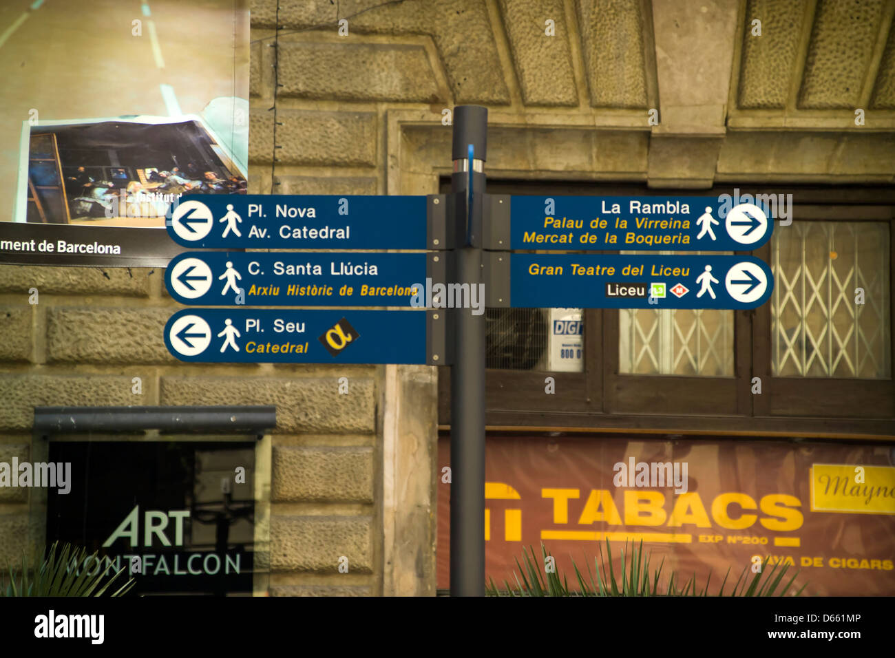 Barcelona street signs, directions, travel. Stock Photo