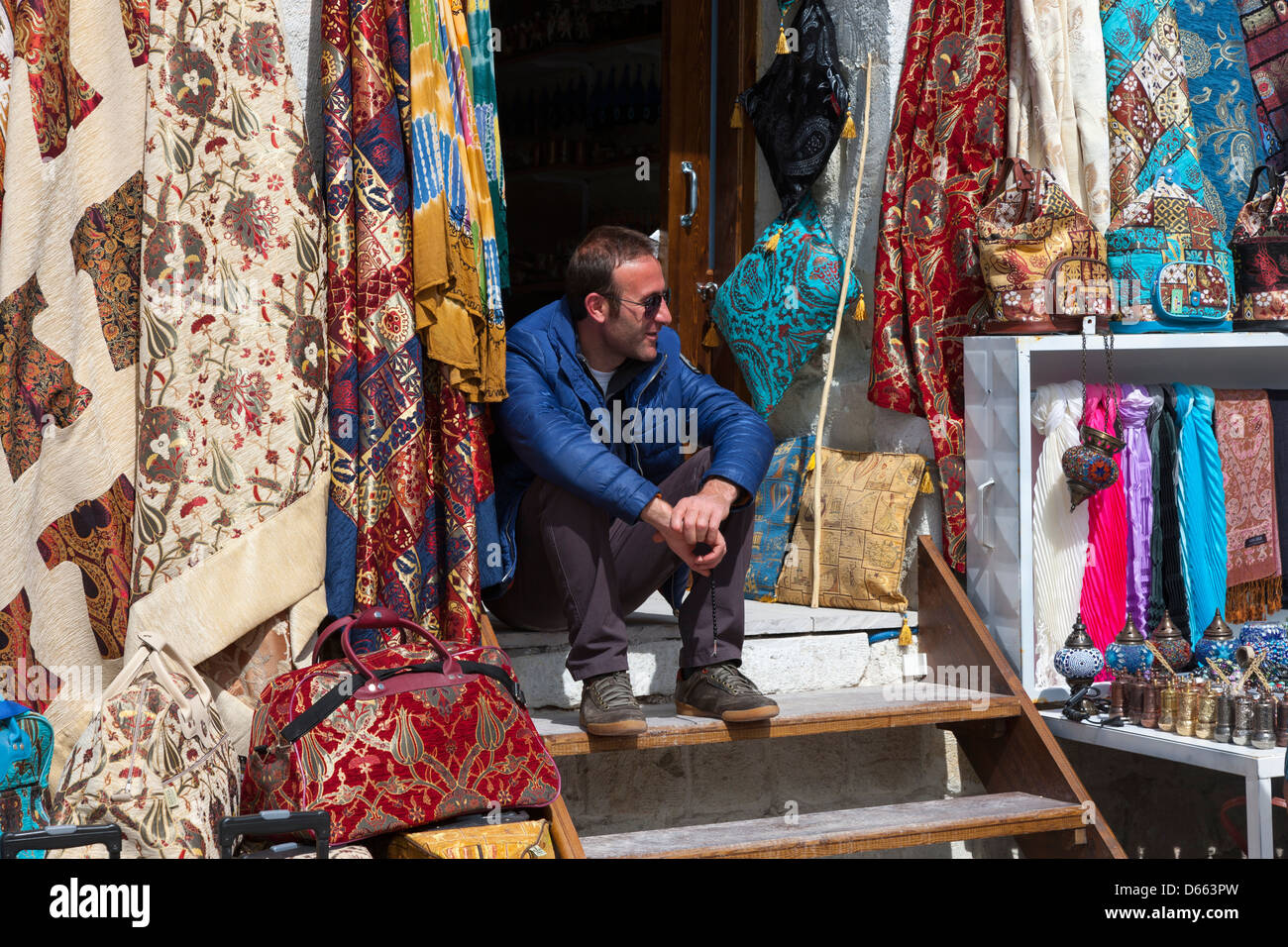 A shopkeeper outside his souvenir shop in Çavusin near Göreme Stock Photo