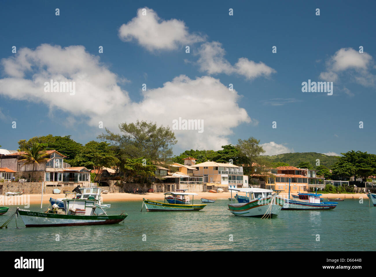 Brazil, state of Rio de Janeiro, Buzios. Waterfront and port area of Buzios with colorful fishing boats. Stock Photo
