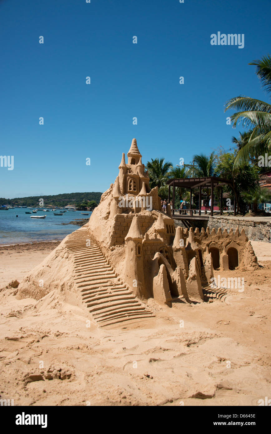 Brazil, state of Rio de Janeiro, Buzios. Sand castle on beach. Stock Photo