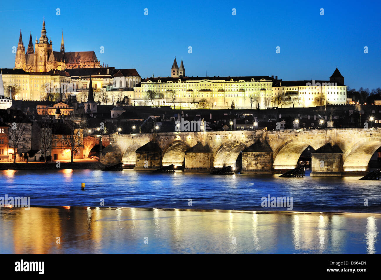 Charles Bridge and Vltava river by night, in the background the castle, Prague Stock Photo
