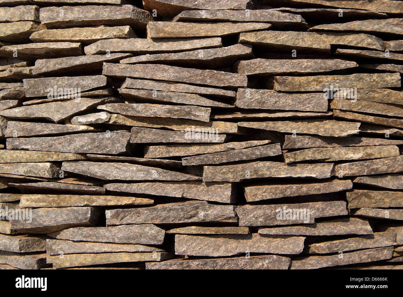 Stone wall natural background and texture of decorate Stock Photo - Alamy