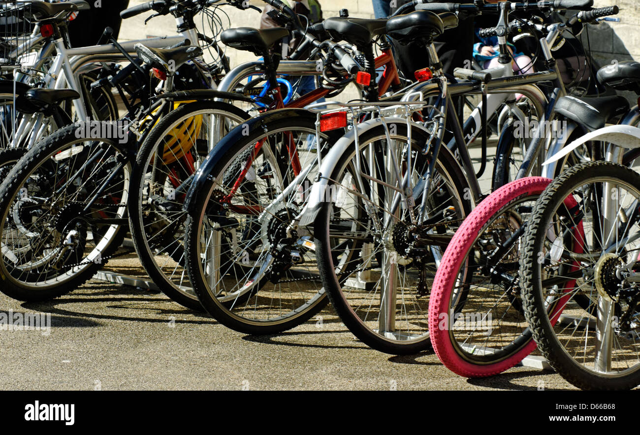 Bicycles parked in Broad Street, Oxford, UK Stock Photo