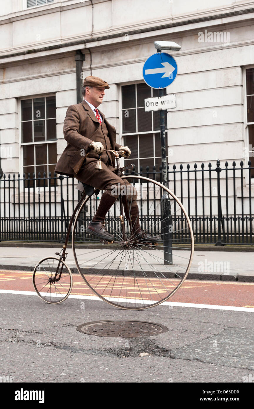The Tweed Run on 13/04/2013 starting from University College of London, Gower Street, London. This is the 5th Birthday of the Tweed Run (established in 2009) which is a bicycle ride through London with participants mainly dressed in a classic style. There are prizes awarded at the end of the day which include 'Most Dapper Chap' and 'Most Dashing Dame'. Picture by Julie Edwards Stock Photo