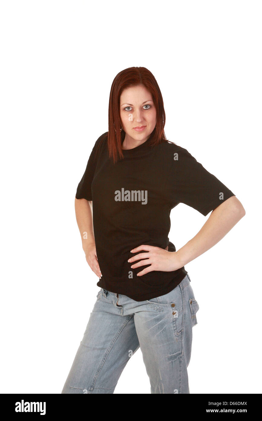 Cut out of young attractive woman on a pure white background in a black coloured t shirt and jeans Stock Photo