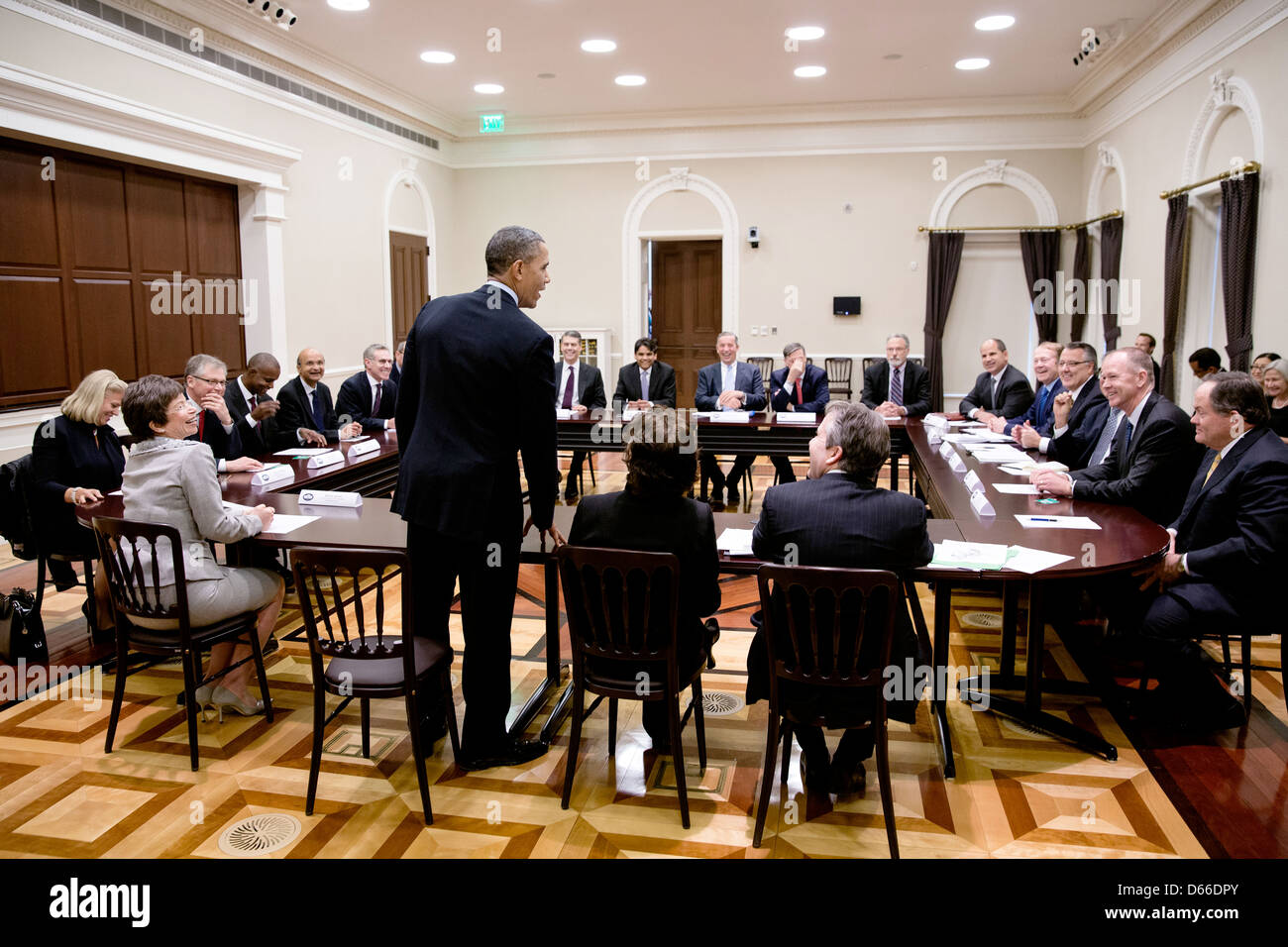 US President Barack Obama drops by a meeting with the