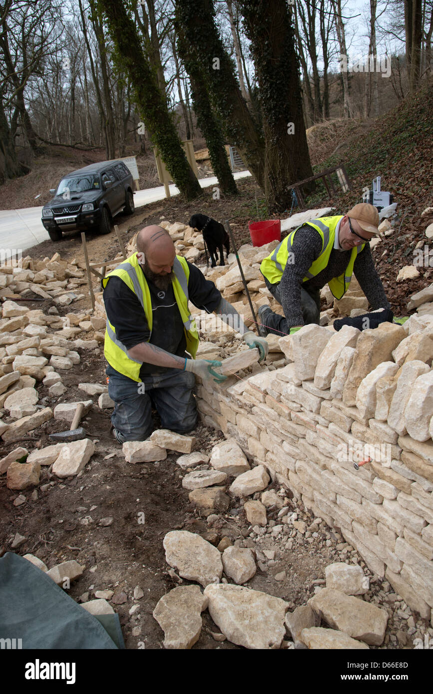 Dry stone walling on the roadside in the Cotswolds Gloucestershire UK Stock Photo