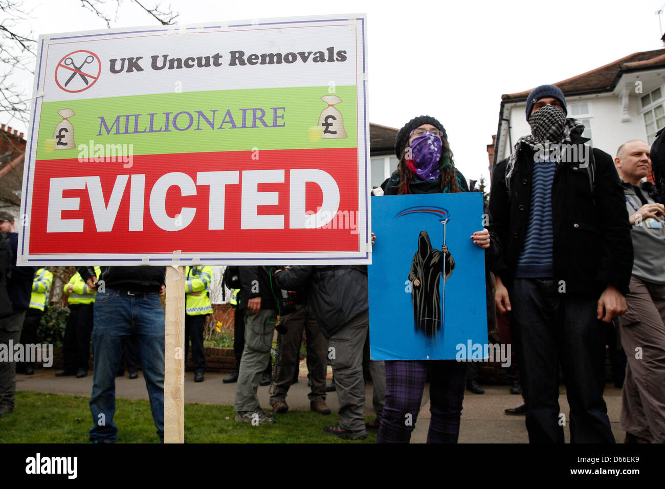 London, UK. 13th April 2013. The 'Who wants to evict a millionaire?' event held by UK Uncut were using civil disobedience in London protesting against a massive wave of cuts that will hit millions of people across the country. Protesters were chanting slogans and holding placards. Credit: Lydia Pagoni /Alamy Live News Stock Photo