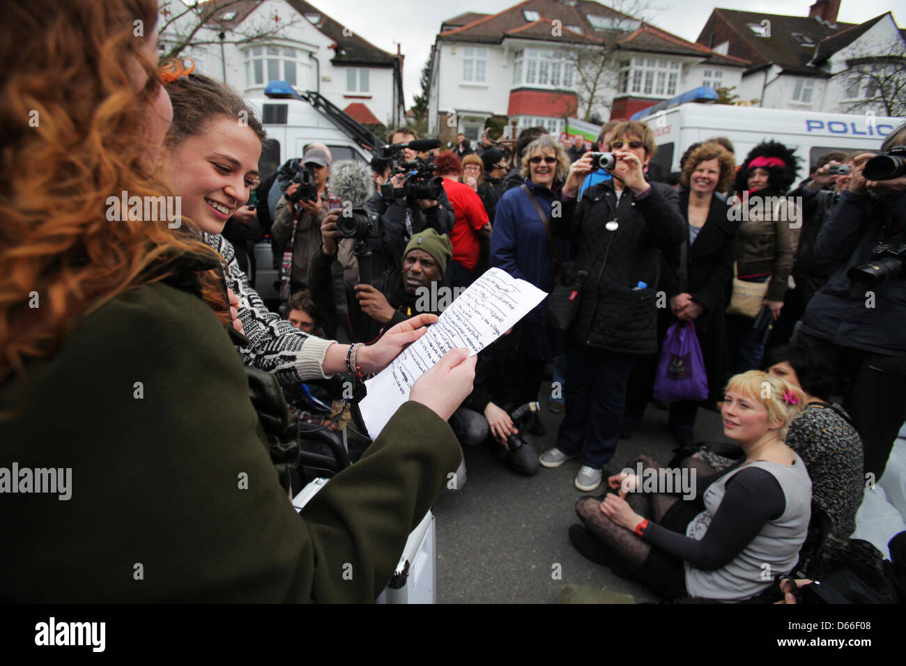 London, UK. 13th April 2013.  Activists read a 'bedtime story' outside the London home of Lord Freud, Welfare Minister and a key proponent of the 'bedroom tax'.Credit: Rob Pinney/Alamy Live News Stock Photo