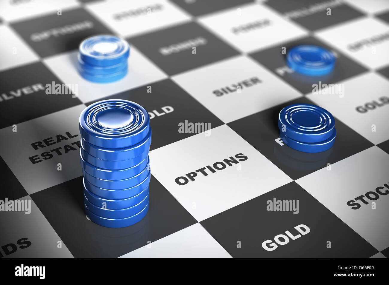 Blue checkers pieces over a financial board where it is written some investment words. Financial concept. Stock Photo