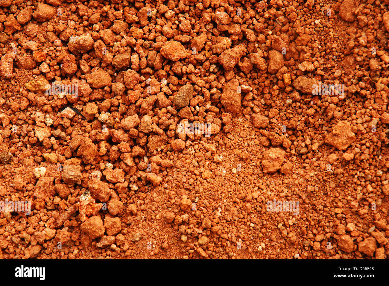 Tropical laterite soil or red earth background. Stock Photo