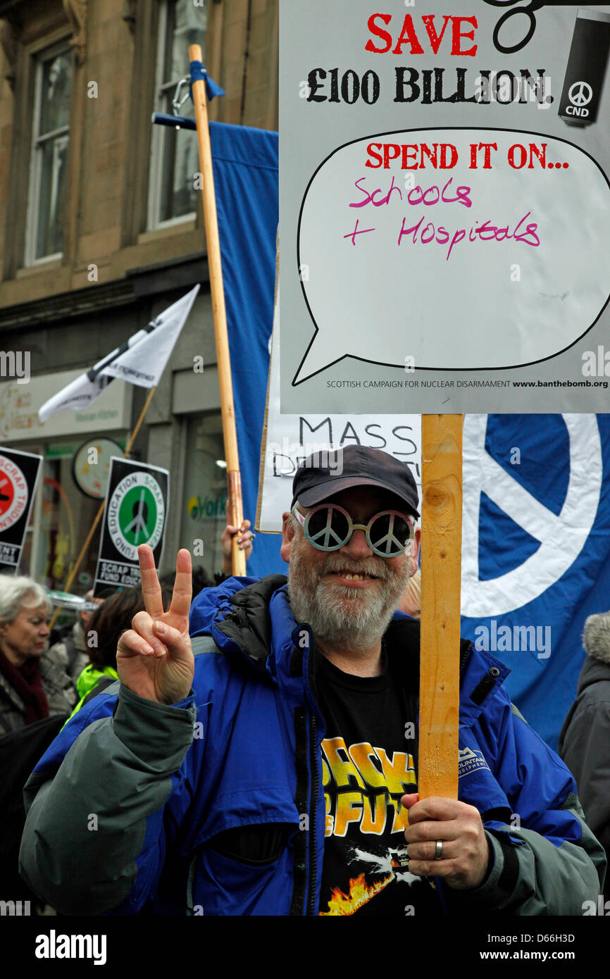Glasgow, Scotland, United Kingdom  13 April 2013. Anti Nuclear weapons and Anti Trident march and demonstration beginning in George Square, Glasgow, Scotland and parading round the city centre before ending in a rally back at George Square. Approximately 5000 campaigners attended from all over the UK and representing  different anti nuclear organisations. This was a march to organise support for a mass sit-in at  Faslane Naval base on Monday 15th April 2013. Credit: Findlay/Alamy Live News Stock Photo