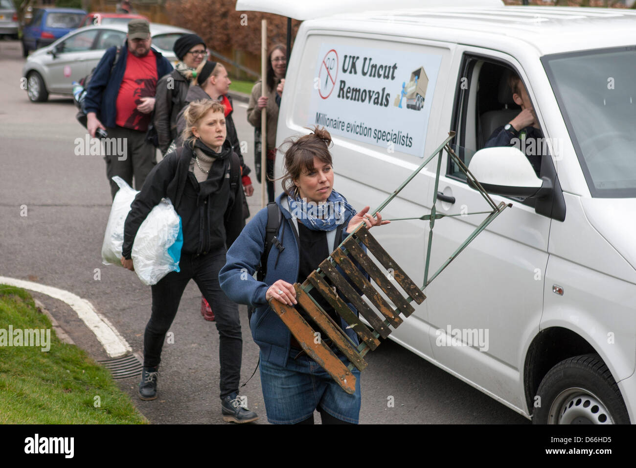 London, UK. 13th April 2013. UK Uncut activists en route to stage 'Who Wants to Evict a Millionaire' event outside the home of Lord Freud, architect of the Welfare Reform Bill. Credit: Martyn Wheatley / Alamy Live News Stock Photo