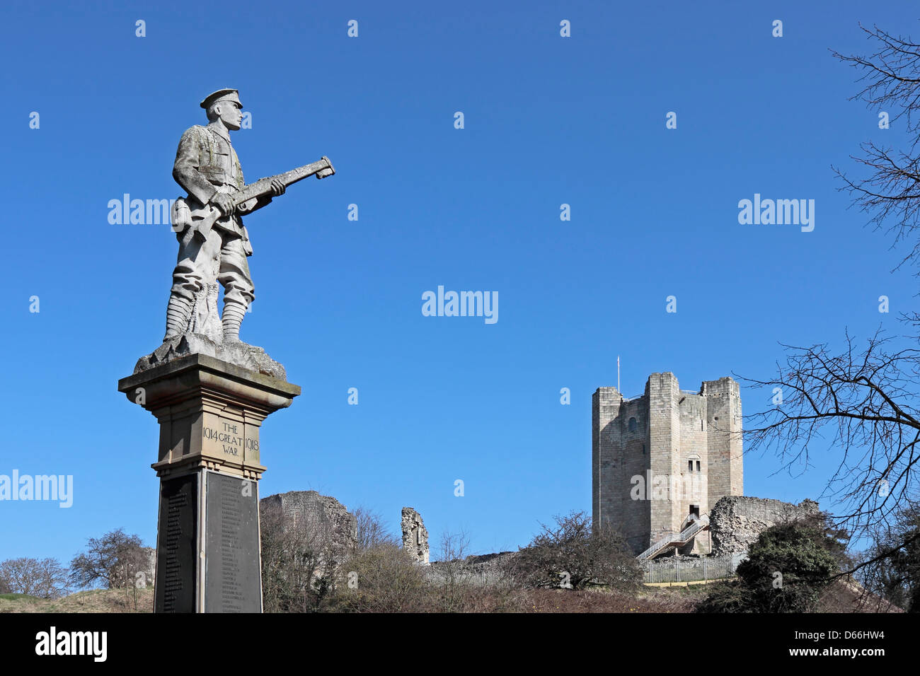 Conisbrough First World War Memorial with Conisbrough Castle in the background Stock Photo