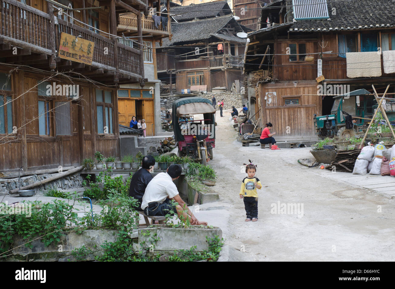 Street scene in the Zhaoxing village and river  in the Guizhou province of China Stock Photo