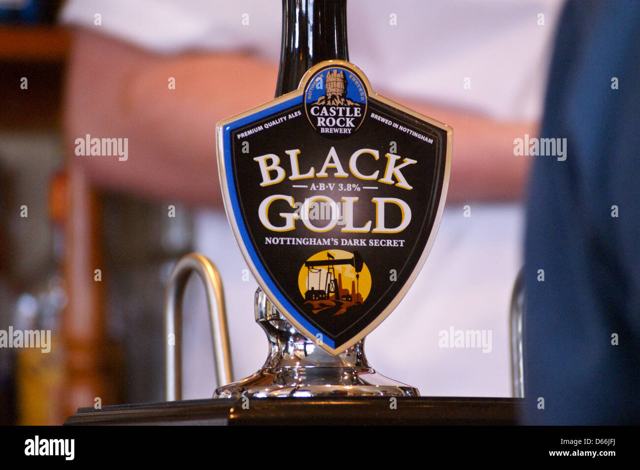 A pump clip of 'Black Gold' dark mild ale  beer from Castle Rock brewery, Nottingham Stock Photo