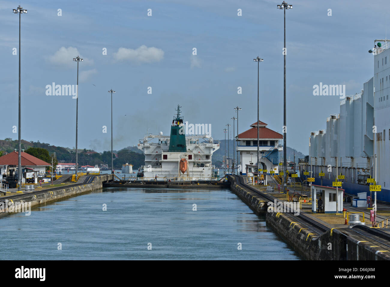 The Panama Canal, with its 48-mile ship canal in Panama, connects the Atlantic Ocean to the Pacific Ocean. Stock Photo