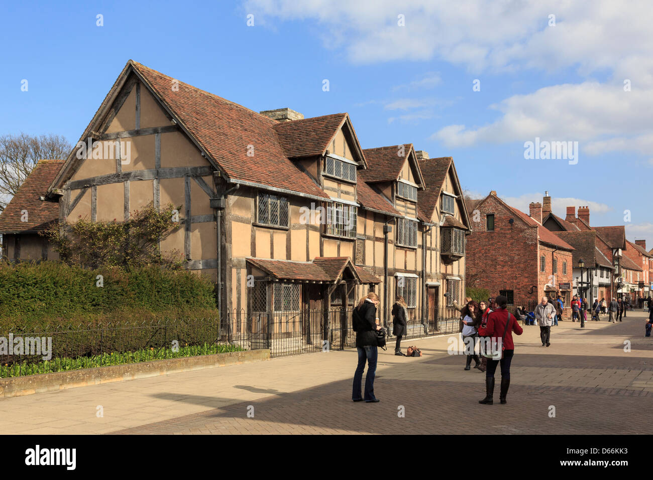 Street scene by Shakespeare's Birthplace 16th century timbered house now a museum. Henley Street Stratford-upon-Avon Warwickshire England UK Britain Stock Photo