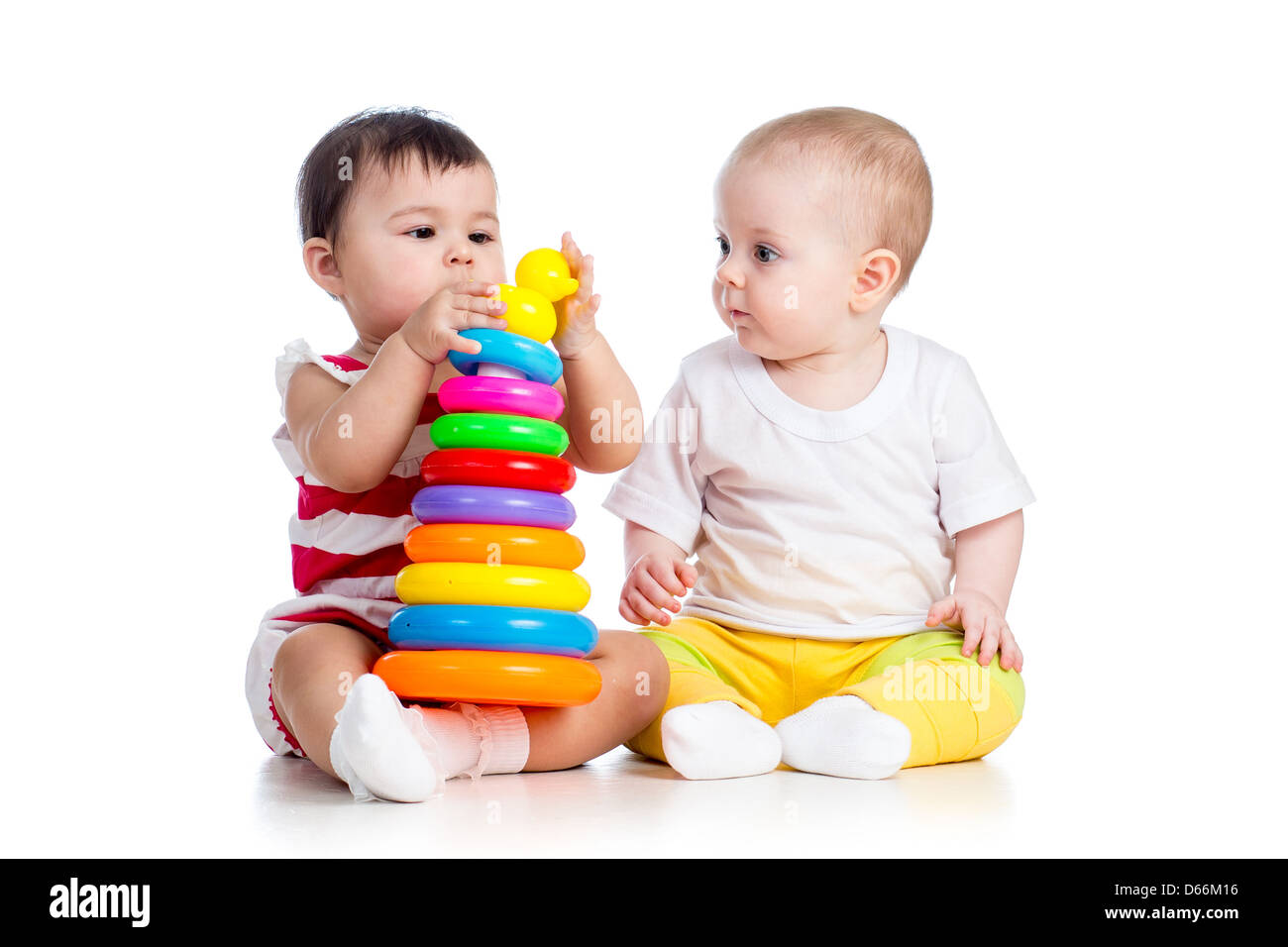 kids girls playing toy together Stock Photo