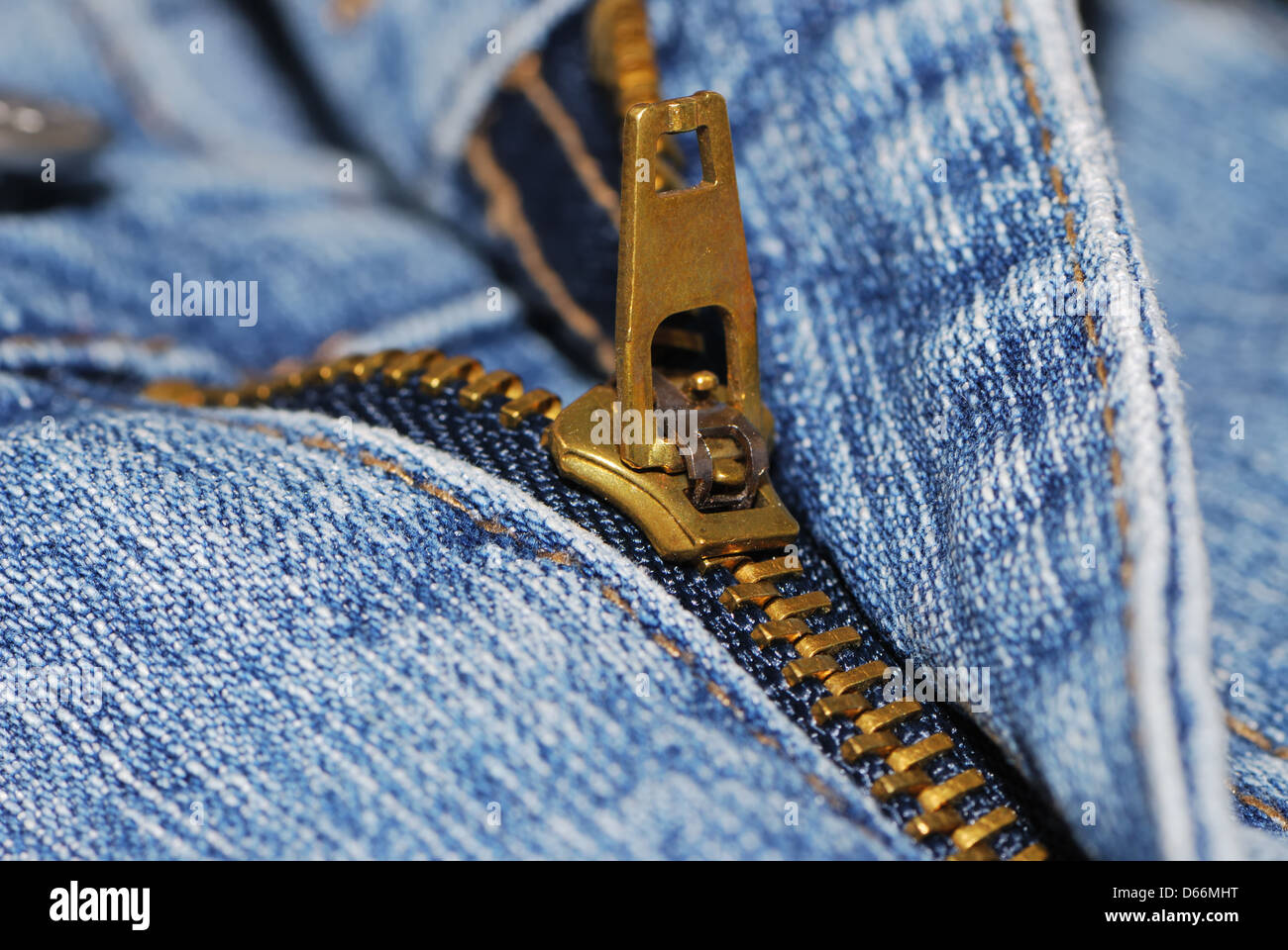 half open zipper of a blue jeans Stock Photo - Alamy