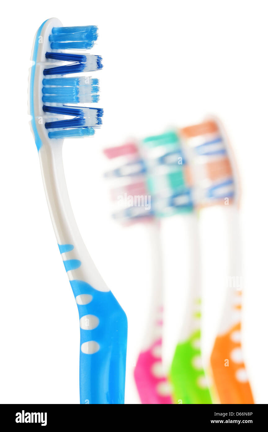 Composition with toothbrushes isolated on white background Stock Photo