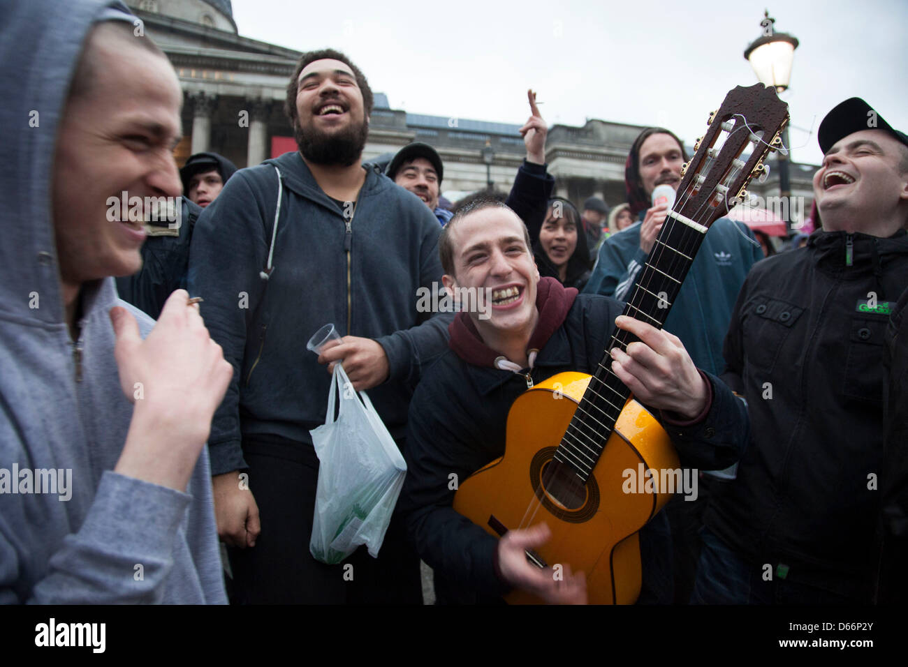 Revellers make music and sing along happily for the margaret thatcher