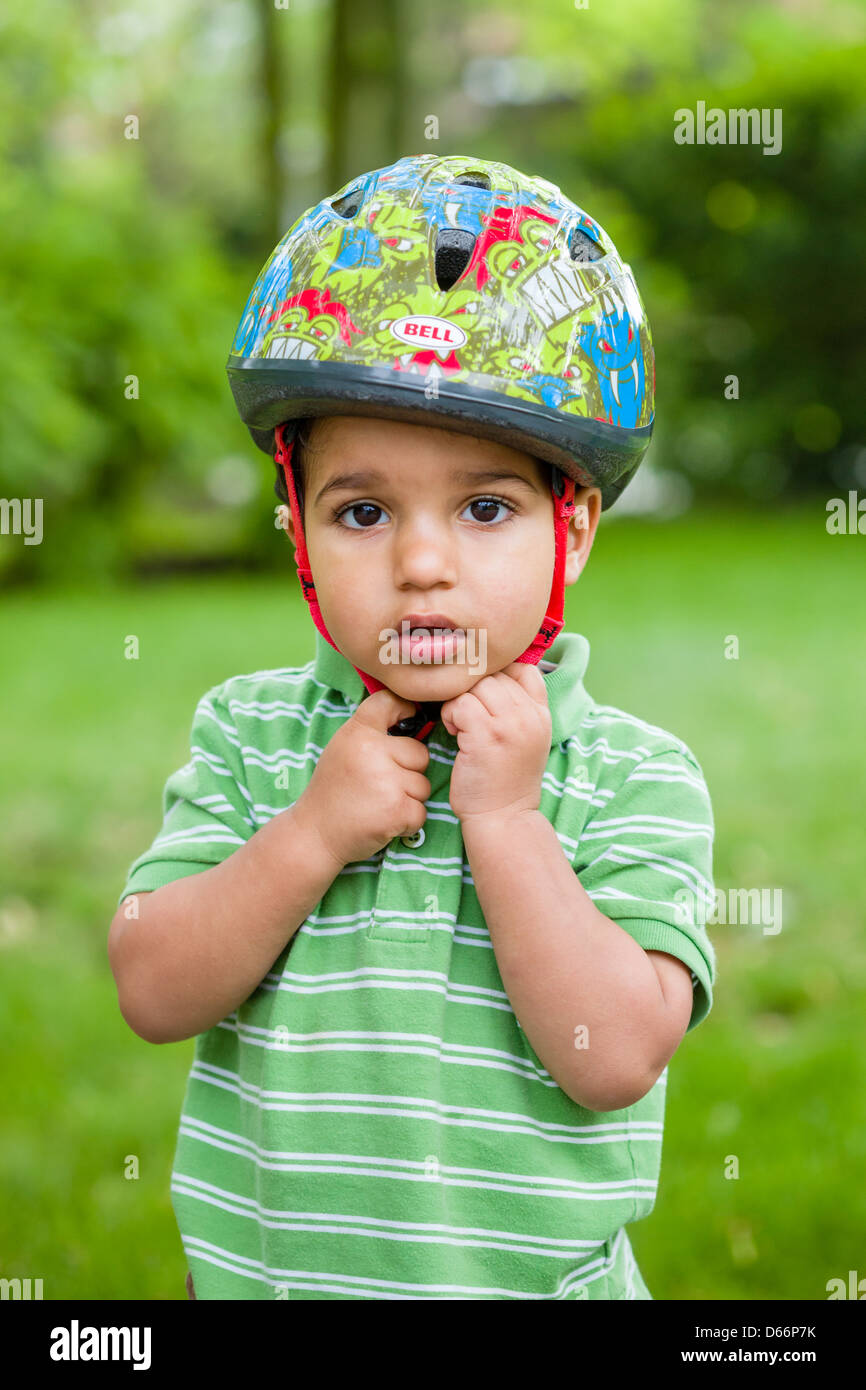 Young boy with protective helmet Stock Photo Alamy