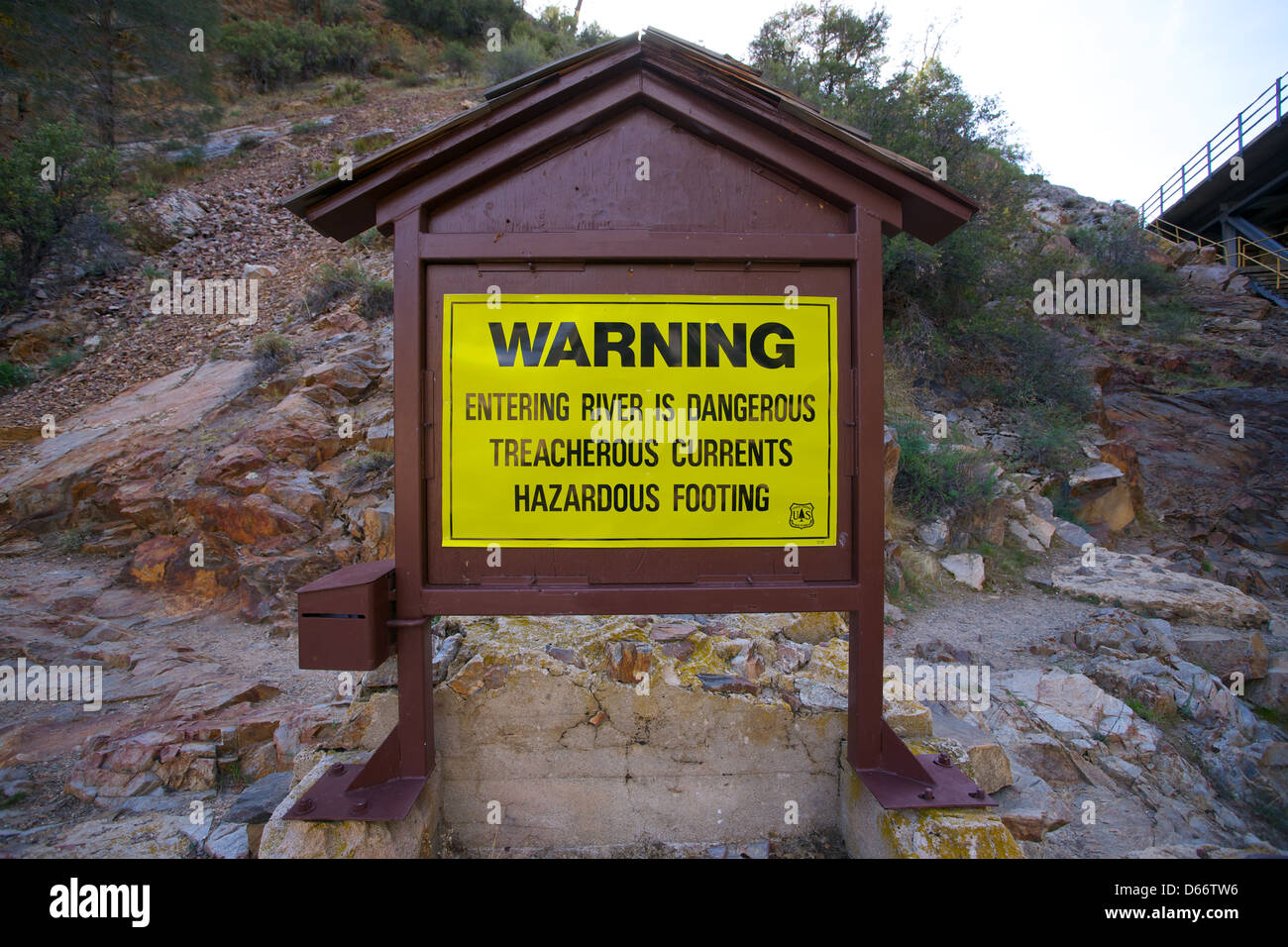 Warning Sign tells of dangerous currents in the Kern River Stock Photo
