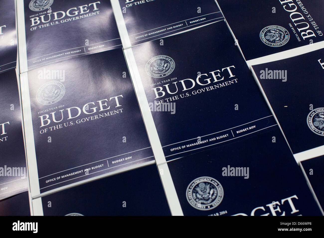 Copies of the fiscal year 2014 Federal Budget are bound at the Government Printing Office. Stock Photo