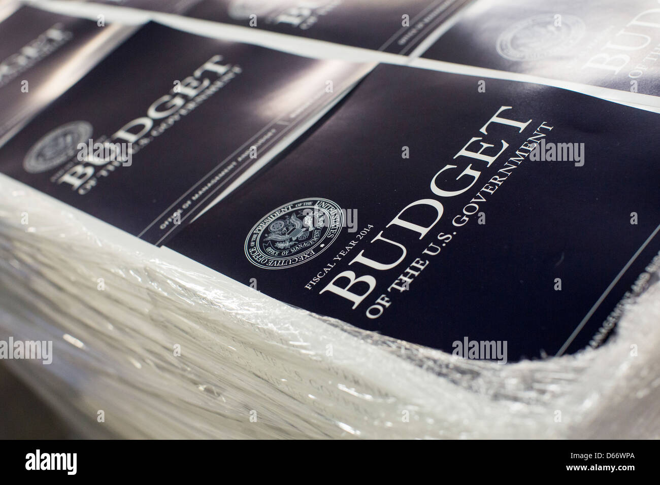 Copies of the fiscal year 2014 Federal Budget are bound at the Government Printing Office. Stock Photo