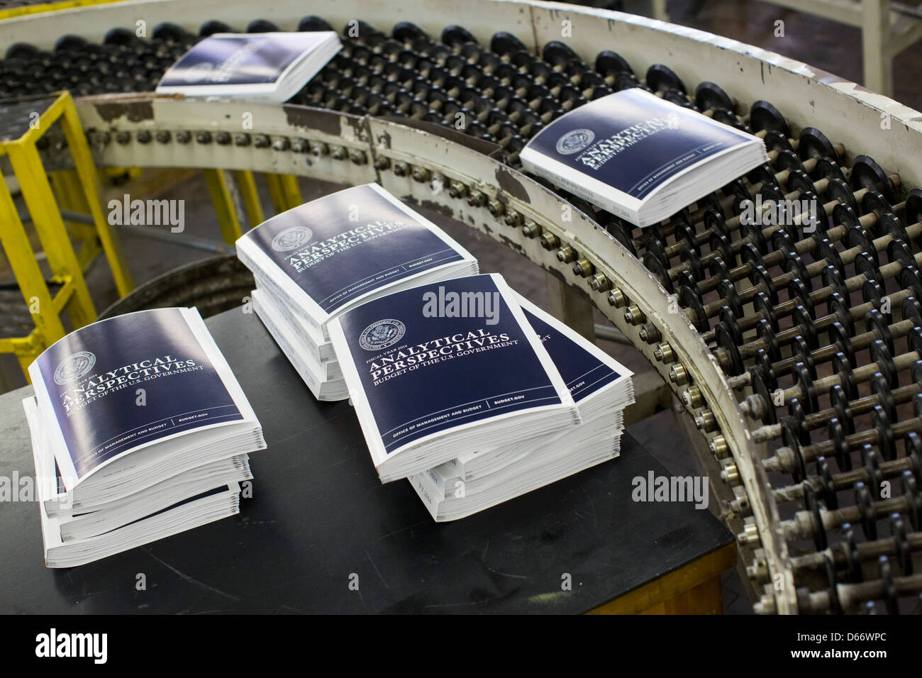 Copies of the fiscal year 2014 Federal Budget are bound at the Government Printing Office. Stock Photo