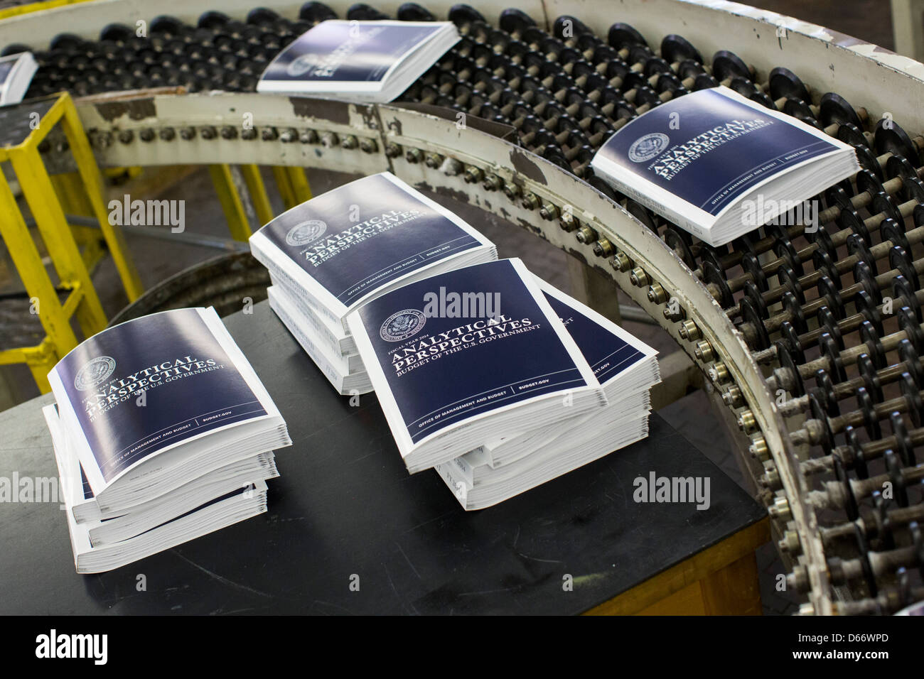 Copies of the fiscal year 2014 Federal Budget are bound at the Government Printing Office. Stock Photo