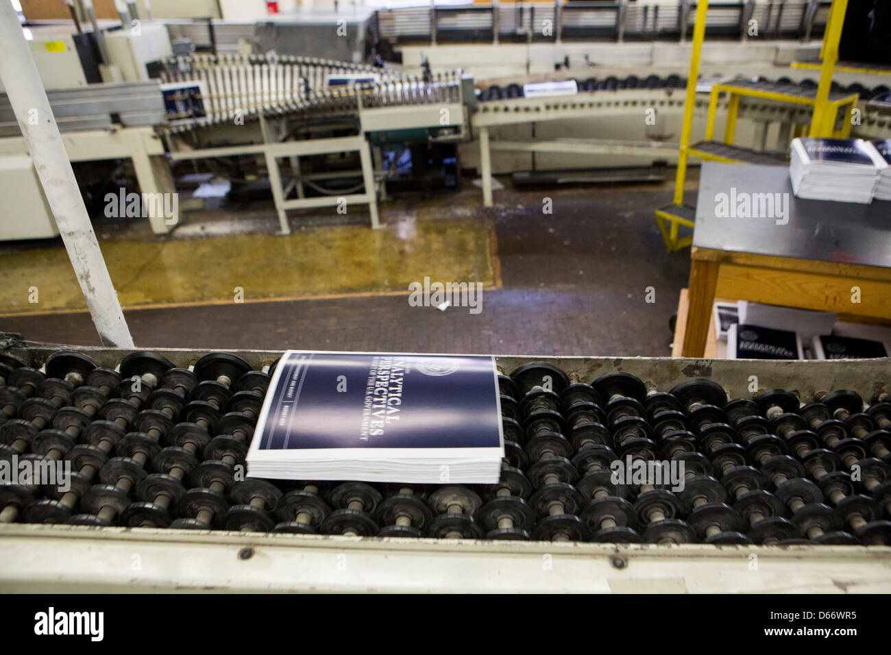 Copies of the fiscal year 2014 Federal Budget are bound at the Government Printing Office. Stock Photo