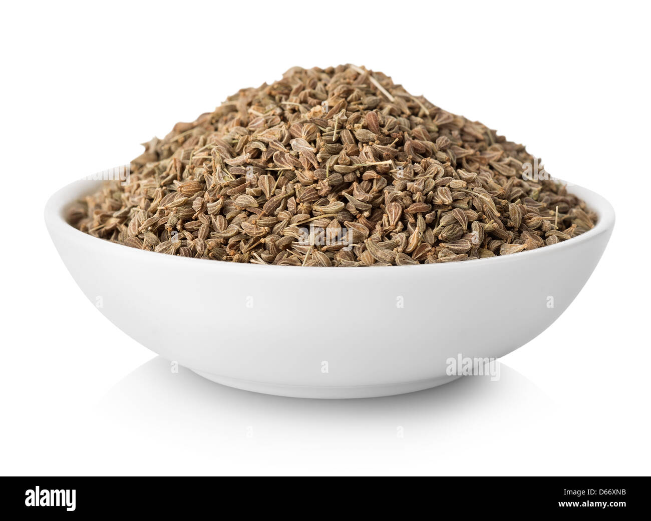 Anise seeds in plate isolated on white background Stock Photo